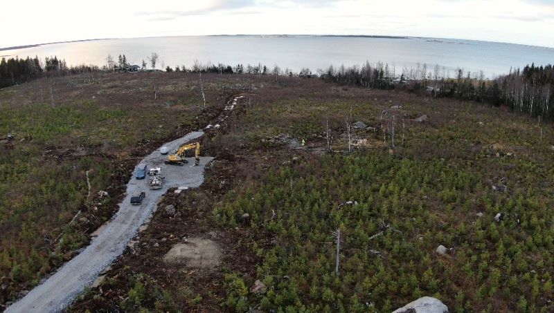 Drone image of a construction site leveling the location of a wind measurement mast near the sea shore. Photo: Roni Lehti